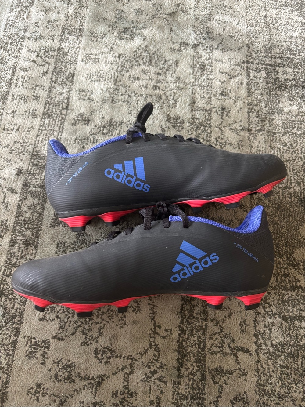 adidas Kids Black Soccer Cleats with Blue Logos and Pink Soles